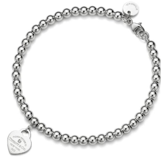 BRAZALETE RETURN TO TIFFANY BRAZALETE CON CUENTAS Y PLACA ESTILO CORAZÓN CON UN MINI DIAMANTE Plata s925